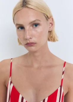 Striped jumpsuit with cut-out